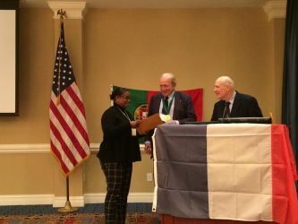 Donald Howard and Victor Massena induct new members of the society at the 2015 Meeting.